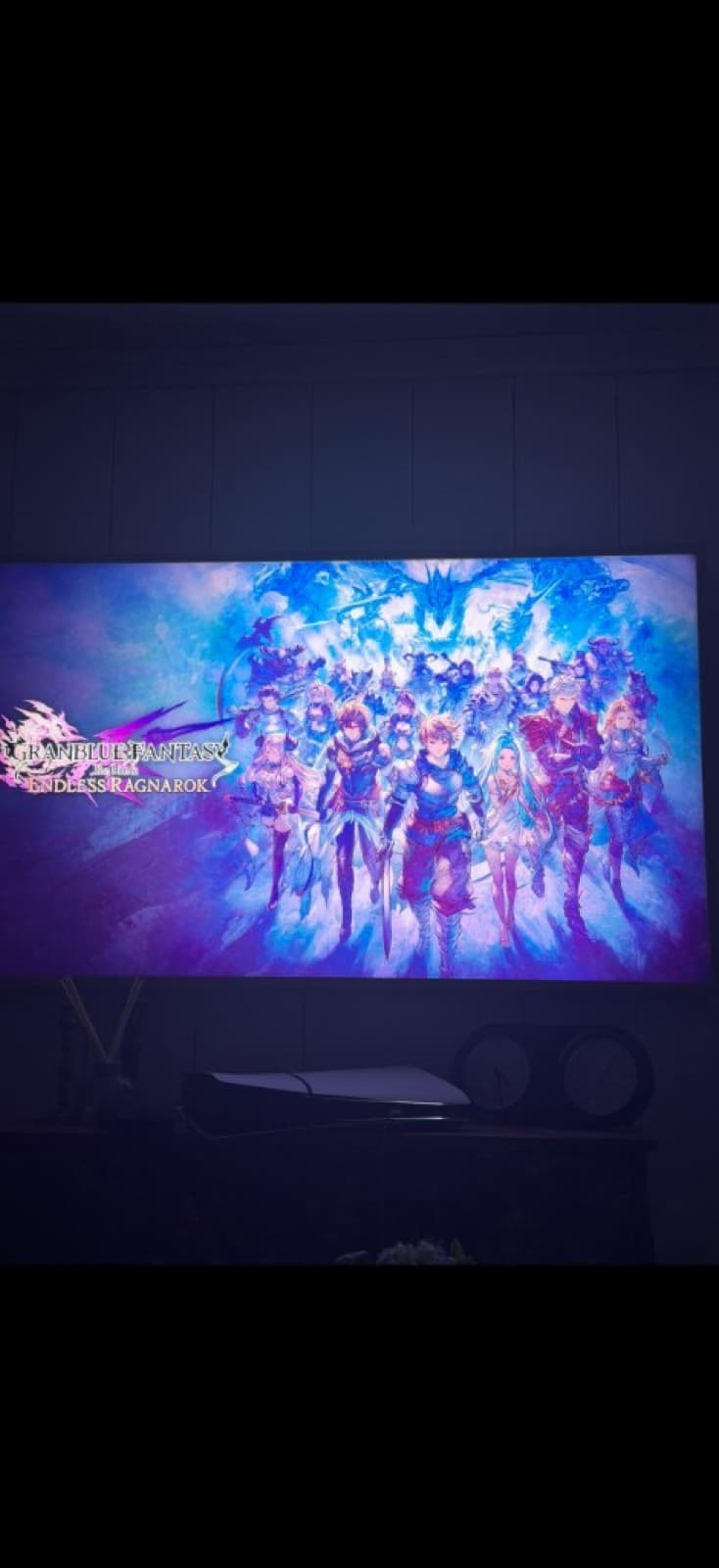 Granblue Fantasy title screen glowing on the Airbnb TV